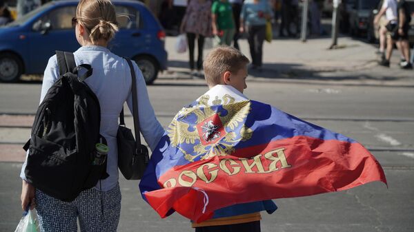 Preparativos para la celebración del Día de la Reunificación de las nuevas regiones con Rusia  - Sputnik Mundo