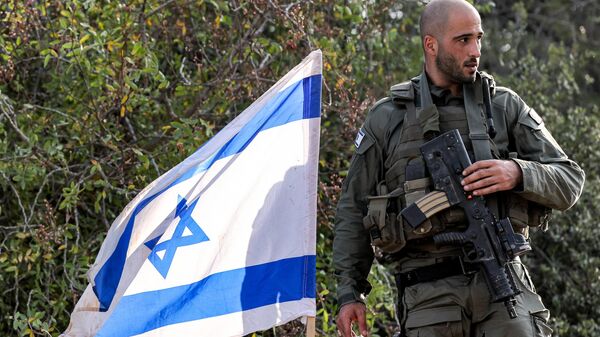Un soldado de Israel en la frontera con Gaza - Sputnik Mundo