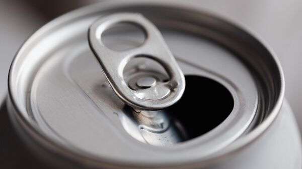 Una lata de refresco. Imagen referencial - Sputnik Mundo