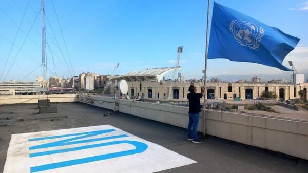 Oficinas de la ONU bajan banderas a media asta por muerte de 101 empleados en Gaza - Sputnik Mundo