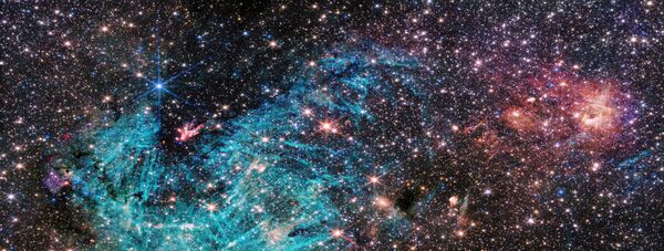 El telescopio espacial James Webb captó una imagen del centro de la Vía Láctea con un nivel inédito de detalle, lo que proporciona a los científicos aún más posibilidades para estudiar el universo. - Sputnik Mundo