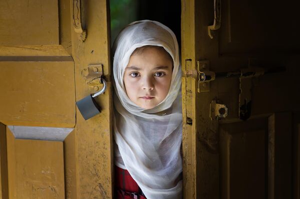 Una imagen del fotógrafo turco F. Dilek Yurdakul, que ganó el premio de Mejor Imagen Individual (Best Single Image in a Portfolio) en la categoría Historias Visuales. La foto fue tomada en el pueblo pakistaní de Kalash, en Chitral. - Sputnik Mundo