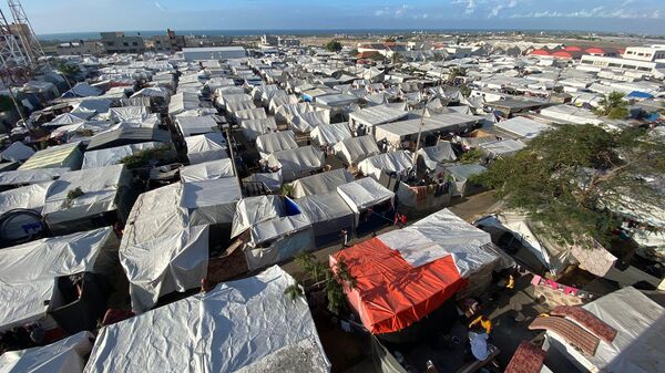 Campamentos para desplazados en la Franja de Gaza, consecuencia del asedio israelí contra el enclave palestino - Sputnik Mundo