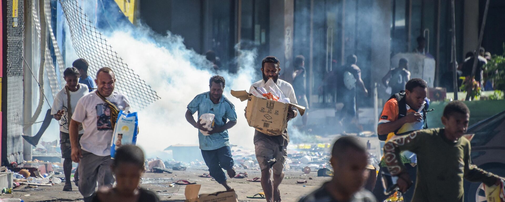 Escenarios de caos y saqueos en Port Moresby, capital de Papúa Nueva Guinea, el 10 de enero de 2024, en medio de protestas.  - Sputnik Mundo, 1920, 19.02.2024