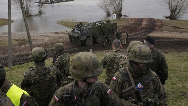 Tropas de la OTAN participan en las maniobras militares Steadfast Defender 24 en Korzeniewo, Polonia. - Sputnik Mundo