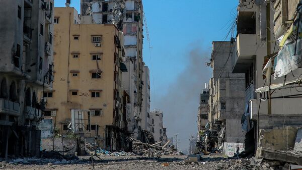 Destrucción causada por ataques israelíes en la ciudad de Gaza, el 25 de marzo de 2024 - Sputnik Mundo