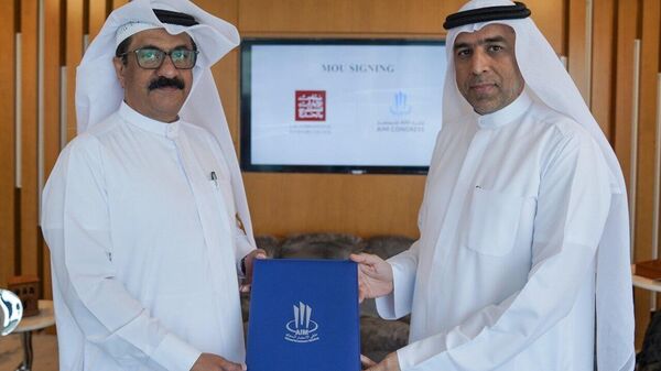 Secretario general del Consejo de Inversores Internacionales de los EAU (UAEIIC), Jamal Saif Jarwan, y el presidente del Congreso AIM, Dawood Shezawi, firman un memorándum - Sputnik Mundo