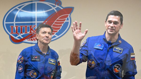 Los cosmonautas rusos Oleg Kononenko y Nikolái Chub - Sputnik Mundo