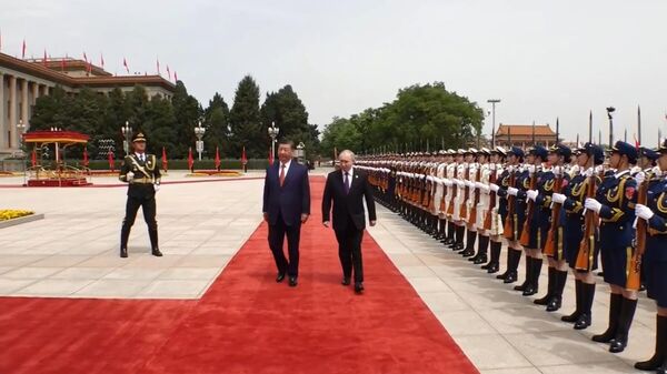 El presidente ruso Vladímir Putin y el mandatario chino Xi Jinping, el 16 de mayo de 2024, en Pekín - Sputnik Mundo