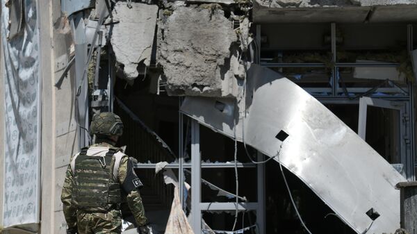 Consecuencias del bombardeo ucraniano en Donetsk - Sputnik Mundo
