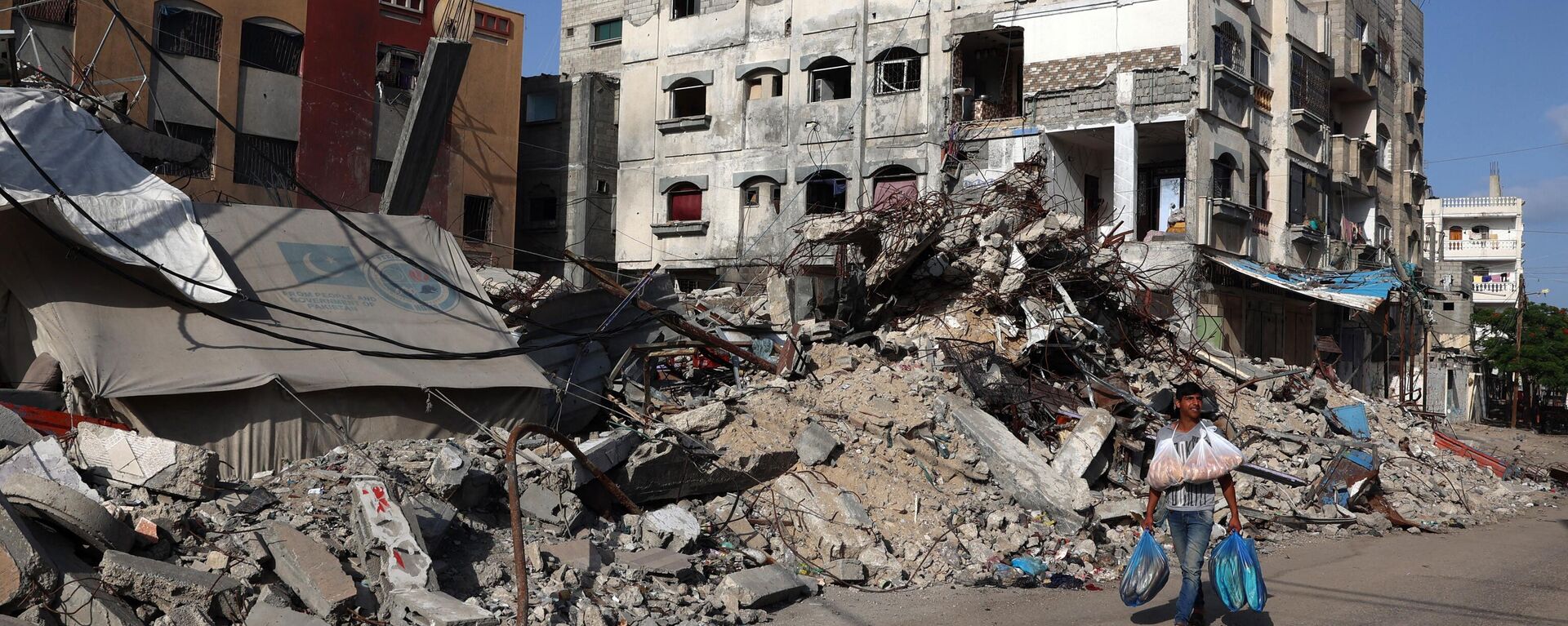Edificio destruido en Rafah - Sputnik Mundo, 1920, 27.05.2024