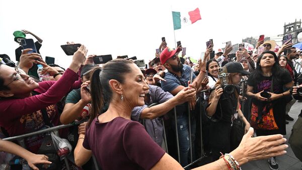 Claudia Sheinbaum durante su cierre de campaña presidencial en el Zócalo de la Ciudad de México - Sputnik Mundo