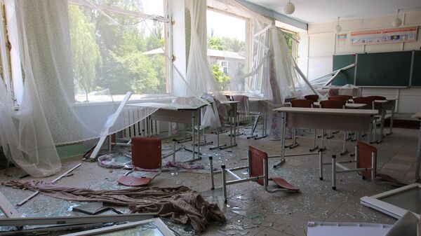 Las consecuencias de un bombardeo ucraniano, la región de Donetsk - Sputnik Mundo