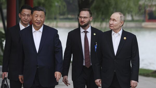 Xi Jinping y Vladímir Putin - Sputnik Mundo