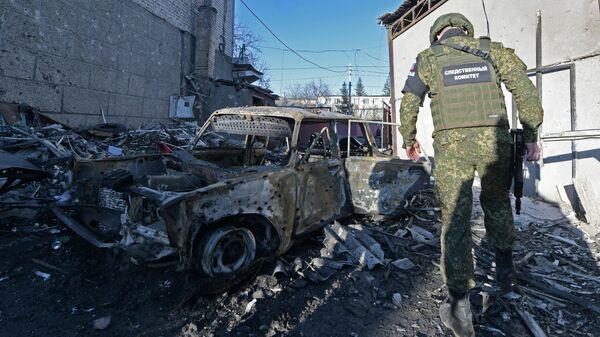 Consecuencias de un bombardeo ucraniano en la región de Donetsk - Sputnik Mundo