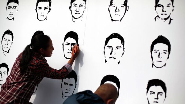 Amnistía Internacional pide justicia en caso de 43 estudiantes secuestrados en México - Sputnik Mundo
