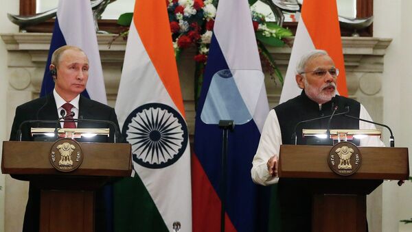 Vladímir Putin,  presidente de Rusia, y  Narendra Modi, primer ministro de India - Sputnik Mundo