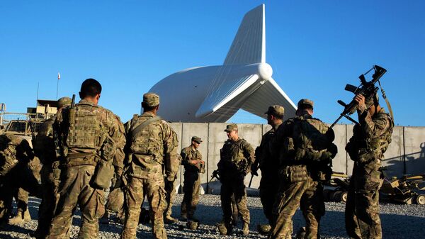 U.S. soldiers from the 3rd Cavalry Regiment prepare for a mission at Forward Operating Base Gamberi which remains part of the ongoing Operation Resolute Support in the Laghman province of Afghanistan December 11, 2014. - Sputnik Mundo
