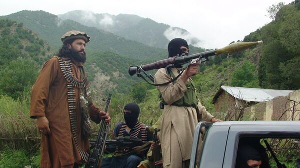 Pakistani Taliban patrol. - Sputnik Mundo