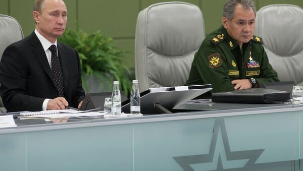Vladímir Putin, presidente de Rusia y Serguéi Shoigú, ministro de Defensa de Rusia - Sputnik Mundo