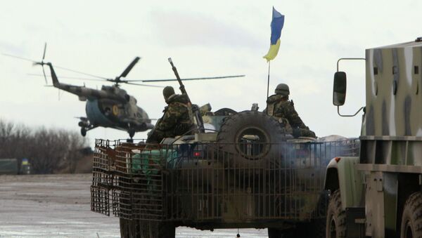 Convoy militar de Ucrania  en la base militar cerca de la ciudad Kramatorsk en este de Ucrania ,24 de Diciembre, 2014 - Sputnik Mundo