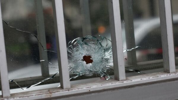 Un policía herido por varios disparos en los suburbios de París - Sputnik Mundo