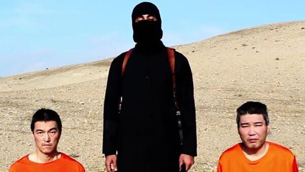 El Estado Islámico amenaza en un vídeo con ejecutar a dos japoneses si no recibe rescate - Sputnik Mundo