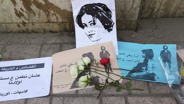 Flowers at the spot where activist Shaimaa Sabbagh died during a protest - Sputnik Mundo