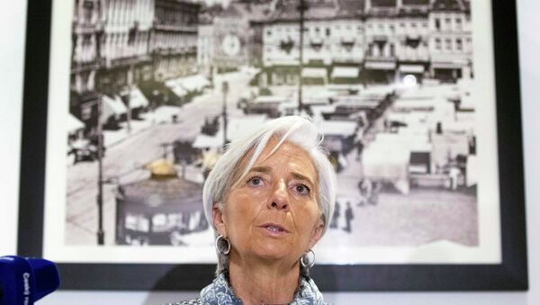 International Monetary Fund (IMF) Managing Director Christine Lagarde speaks about the situation in Ukraine at a news conference in Brussels February 12, 2015 - Sputnik Mundo