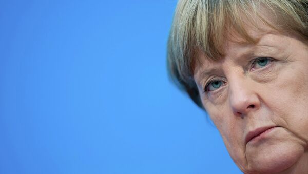 German Chancellor and head of the Christian Democratic Union (CDU) Angela Merkel reacts during a news conference with her party's top candidate Dietrich Wersich at CDU headquarters in Berlin February 16, 2015 - Sputnik Mundo