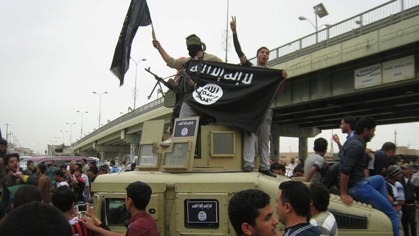 Militantes del grupo yihadista Estado Islámico - Sputnik Mundo