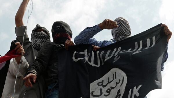 Militantes del grupo yihadista Daesh - Sputnik Mundo