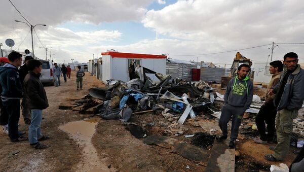 Refugiados sirios en el campo de refugiados de Al-Zaatari en la ciudad jordana de Mafraq - Sputnik Mundo