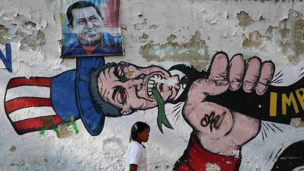 Un graffiti antiamericano en Caracas - Sputnik Mundo