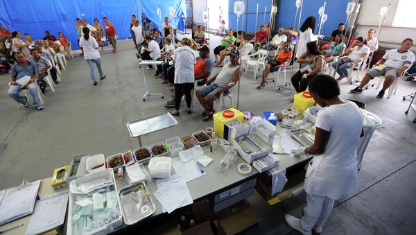 Patients with dengue symptoms are attended to in a medical tent in Rio Claro March 5, 2015. - Sputnik Mundo