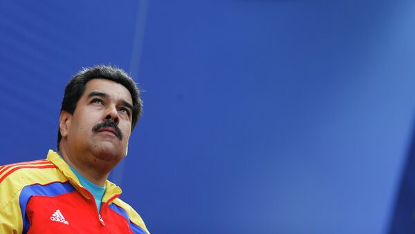Venezuela's President Nicolas Maduro looks on outside Miraflores Palace in Caracas March 15, 2015. - Sputnik Mundo