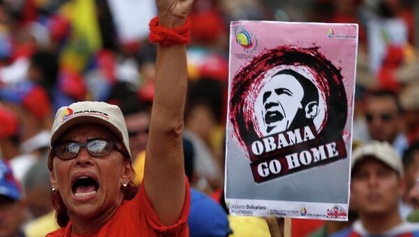 A supporter of Venezuela's President Nicolas Maduro rally against imperialism, in Caracas March 15, 2015 - Sputnik Mundo