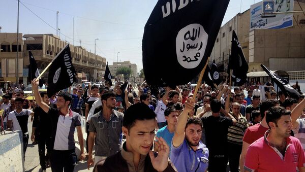 Miembros del grupo yihadista Estado Islámico - Sputnik Mundo