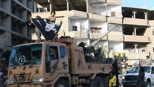 Militantes del grupo yihadista Estado Islámico - Sputnik Mundo