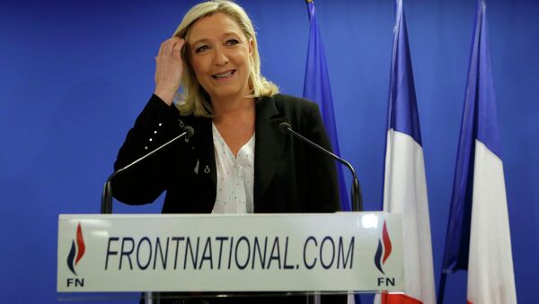 National Front leader Marine Le Pen attends a news conference after the first round of French local elections in Nanterre, near Paris, March 22, 2015. - Sputnik Mundo