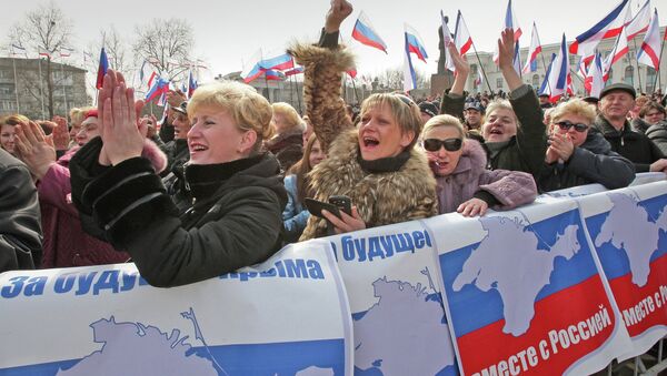 La celebración del aniversario de la adhesión de Crimea a Rusia en Simferópol (archivo) - Sputnik Mundo