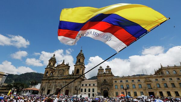 Bandera de  Colombia en la marcha en Bogotá (archivo) - Sputnik Mundo
