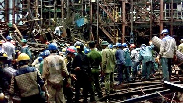 Asciende a 14 el número de muertos a causa de desplome de un edificio en Vietnam - Sputnik Mundo