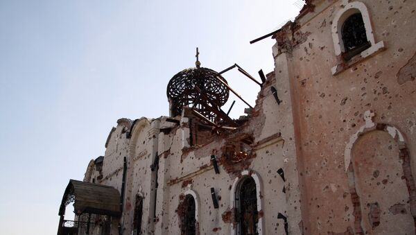 Uno de los monasterios de Donetsk, destruidos durante la operación militar (archivo) - Sputnik Mundo