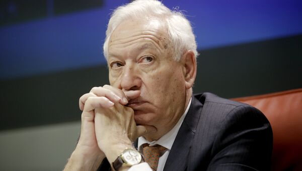 Spanish Foreign Minister Jose Manuel Garcia-Margallo answers a question during a joint news conference with his Iranian counterpart Mohammad Javad Zarif (unseen) at the foreign ministry in Madrid, April 14, 2015 - Sputnik Mundo