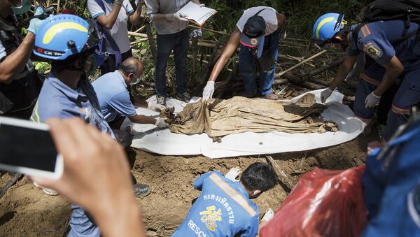 Uno de los cuerpos hallados en Tailandia - Sputnik Mundo