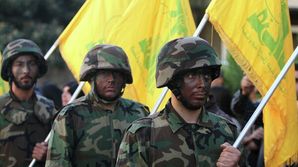 Hezbollah fighters - Sputnik Mundo