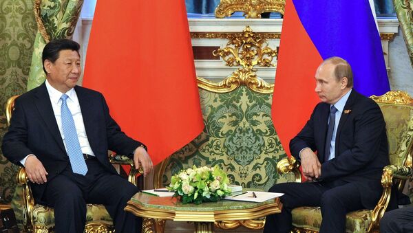 Presidente de China, Xi Jinping (izda.) y presidente de Rusia, Vladímir Putin - Sputnik Mundo