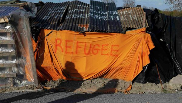 Campo de refugiados africanos en Francia - Sputnik Mundo