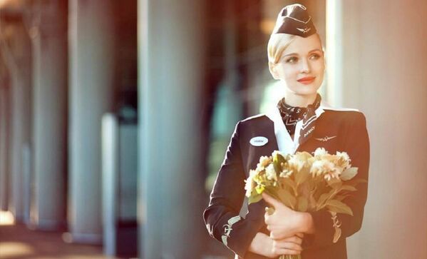 Las azafatas de Aeroflot, el rostro femenino de la mayor aerolínea rusa - Sputnik Mundo